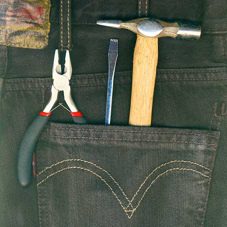 Tools in a jeans pocket